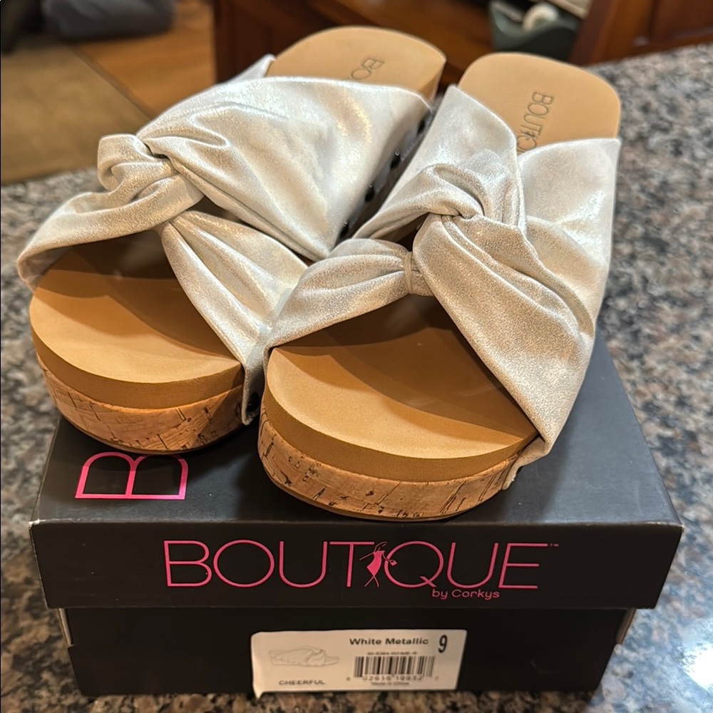Corky’s gently worn (twice) wedge sandals metallic white size 9